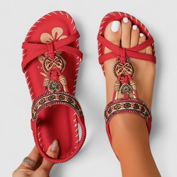 Orthopedic sandals featuring a stability sole and comfort insoles, designed for a secure fit and enhanced foot support. 1