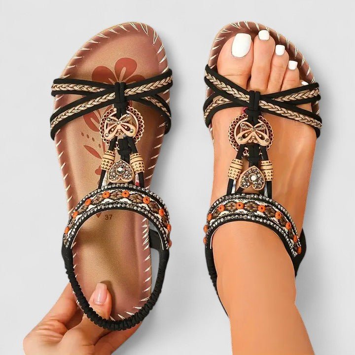 Orthopedic sandals featuring a stability sole and comfort insoles, designed for a secure fit and enhanced foot support. 3