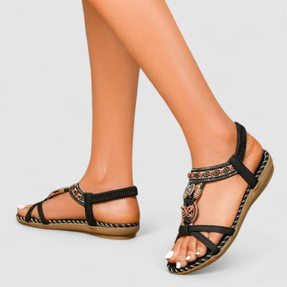 Orthopedic sandals featuring a stability sole and comfort insoles, designed for a secure fit and enhanced foot support. 7