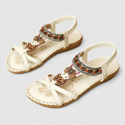 Orthopedic sandals featuring a stability sole and secure heel cap, designed for comfort and support in everyday wear. 9