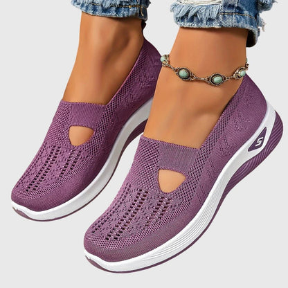 Orthopedic slip-on shoes for women featuring enhanced walking support and breathable insoles for maximum comfort and foot care. 0