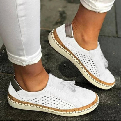 Orthopedic slip-on shoes featuring arch support and a breathable knit upper, designed with a non-slip rubber outsole for all-terrain traction. 2