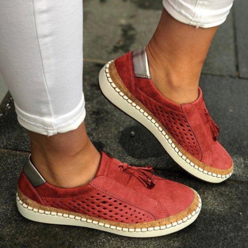 Orthopedic slip-on shoes featuring arch support and a breathable knit upper, designed with a non-slip rubber outsole for all-terrain traction. 1