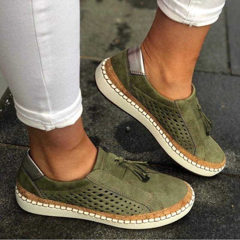 Orthopedic slip-on shoes featuring arch support and a breathable knit upper, designed with a non-slip rubber outsole for all-terrain traction. 0