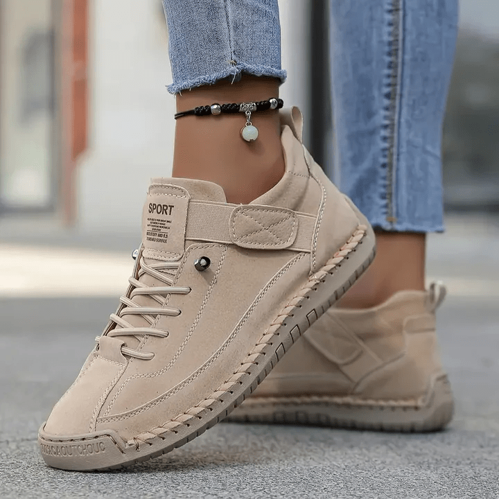 Orthopedic sneakers designed for all-day support and comfort, featuring a wide fit to accommodate various foot shapes and sizes. 1