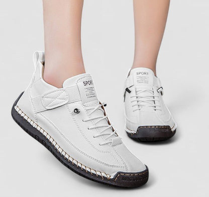 Orthopedic sneakers designed for comfort and support, featuring arch support and a shock-absorbing EVA sole for enhanced cushioning and stability. 2