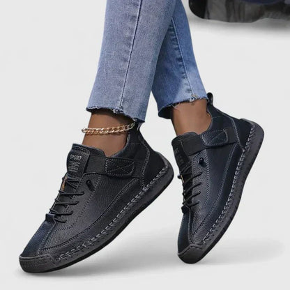 Orthopedic sneakers designed for comfort and support, featuring arch support and a shock-absorbing EVA sole for enhanced cushioning and stability. 0