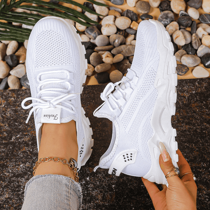 Orthopedic sneakers featuring arch support, shock-absorbing soles, and a wide toe box for ultimate comfort and foot health. 6