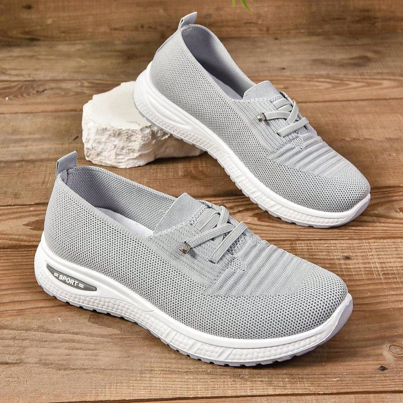 Orthopedic sneakers featuring enhanced arch support and shock absorption, designed with a breathable slip-on style for comfort and ease of wear. 5