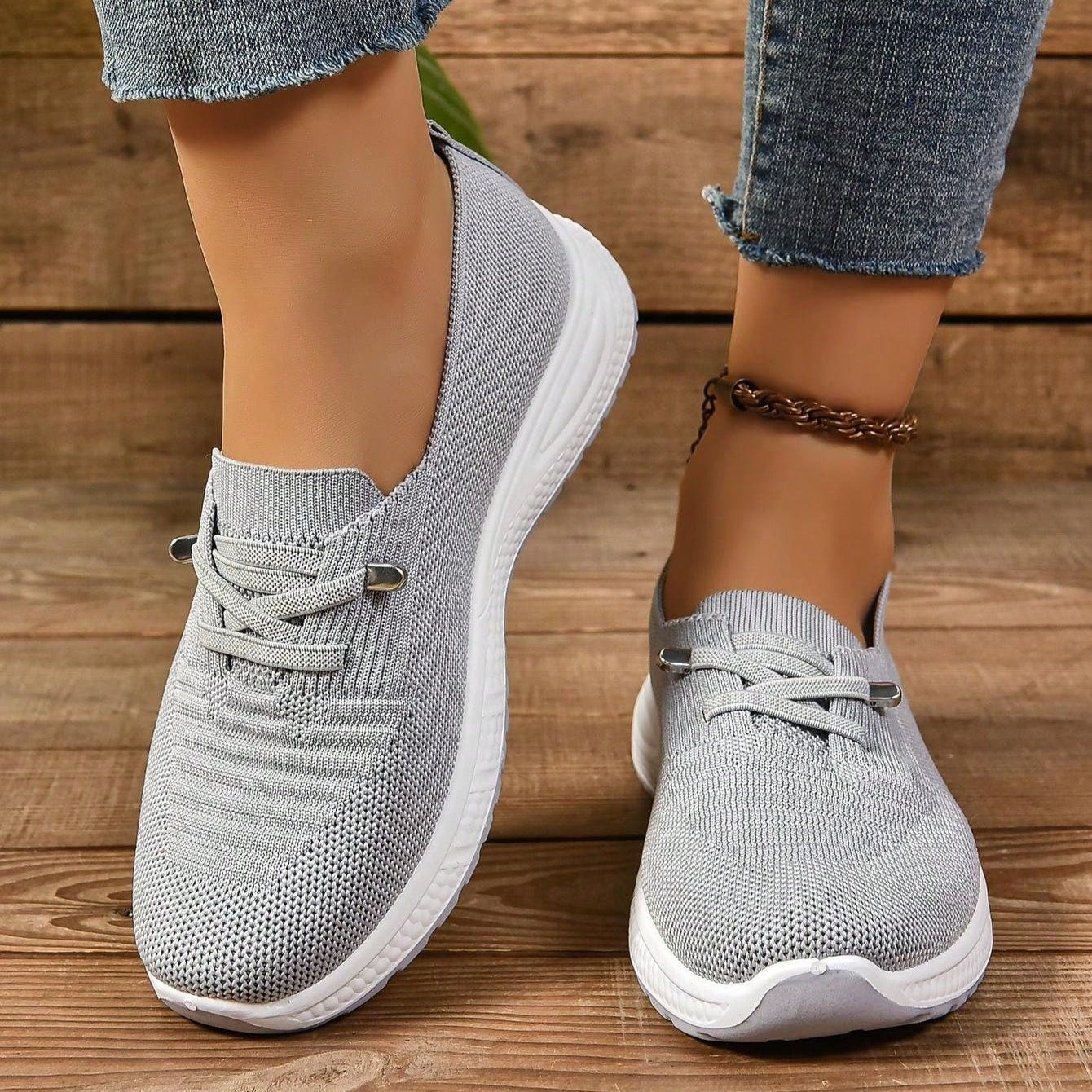 Orthopedic sneakers featuring enhanced arch support and shock absorption, designed with a breathable slip-on style for comfort and ease of wear. 2