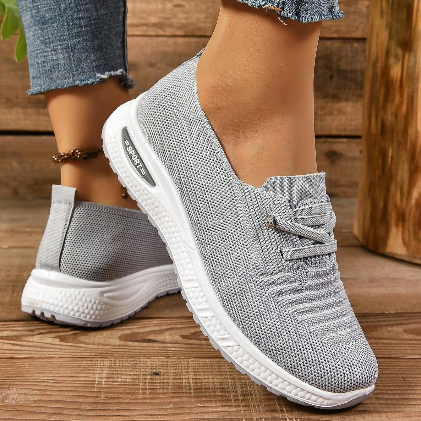 Orthopedic sneakers featuring enhanced arch support and shock absorption, designed with a breathable slip-on style for comfort and ease of wear. 1