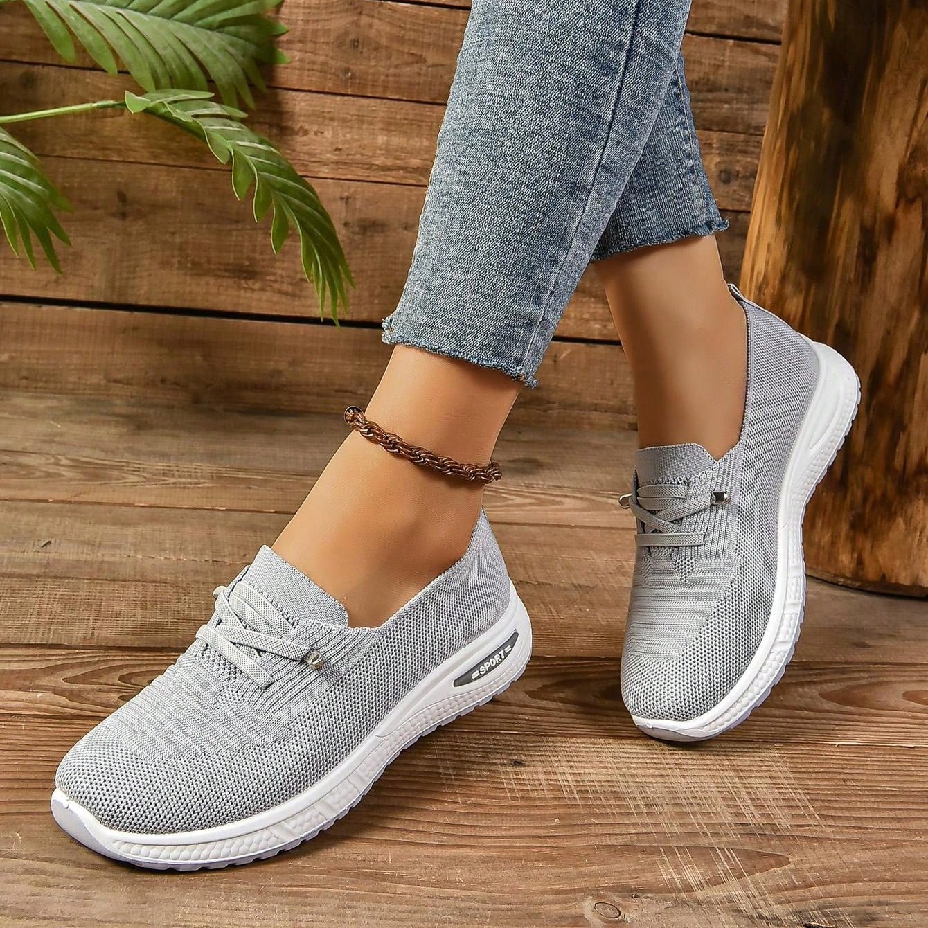 Orthopedic sneakers featuring enhanced arch support and shock absorption, designed with a breathable slip-on style for comfort and ease of wear. 4