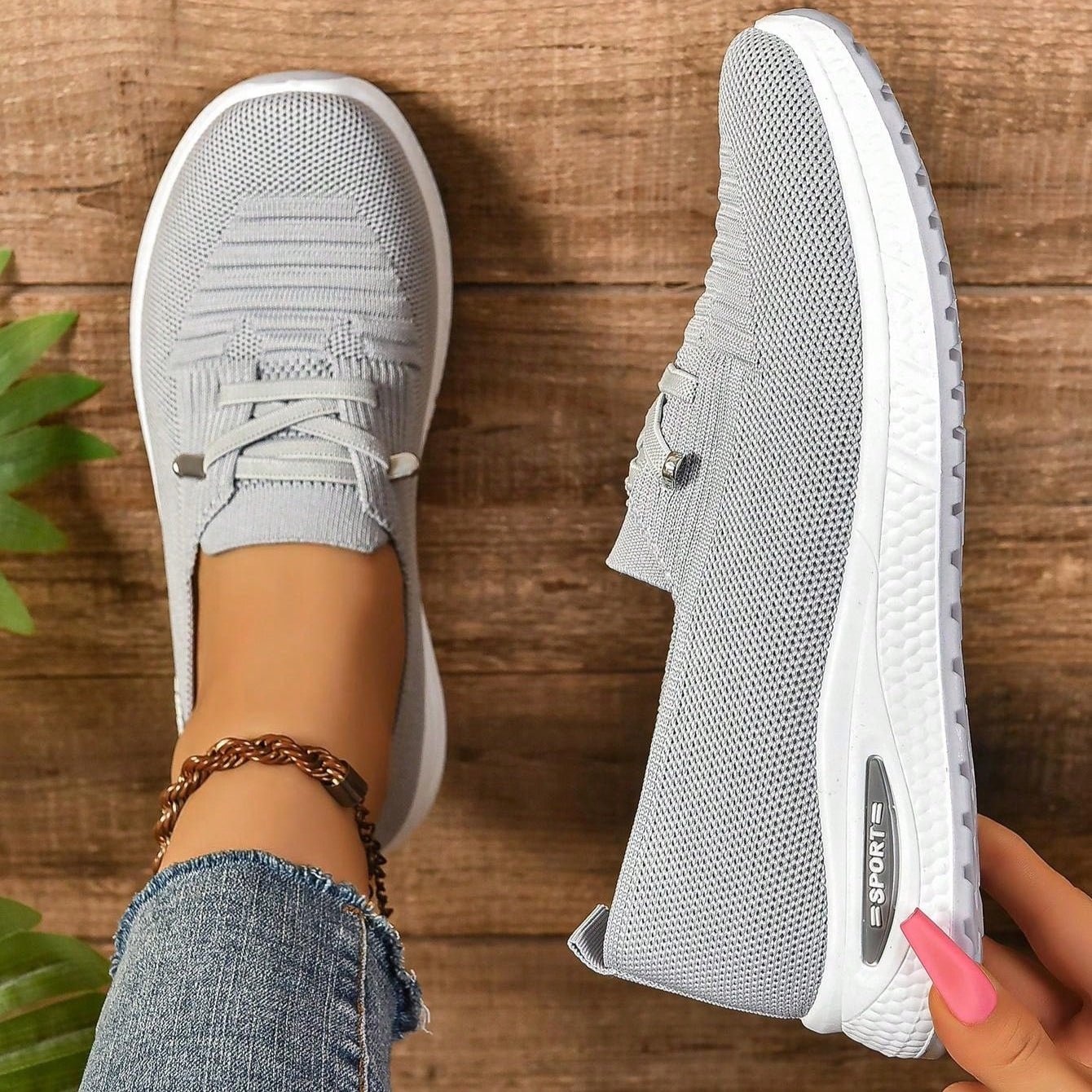 Orthopedic sneakers featuring enhanced arch support and shock absorption, designed with a breathable slip-on style for comfort and ease of wear. 0