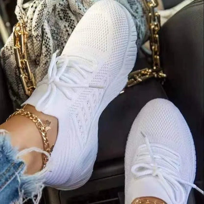 Orthopedic walking sneakers for women featuring a lightweight mesh upper and a supportive footbed, ideal for walking and travel. 1