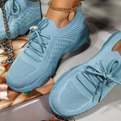 Orthopedic walking sneakers for women featuring a lightweight mesh upper and a supportive footbed, ideal for walking and travel. 6