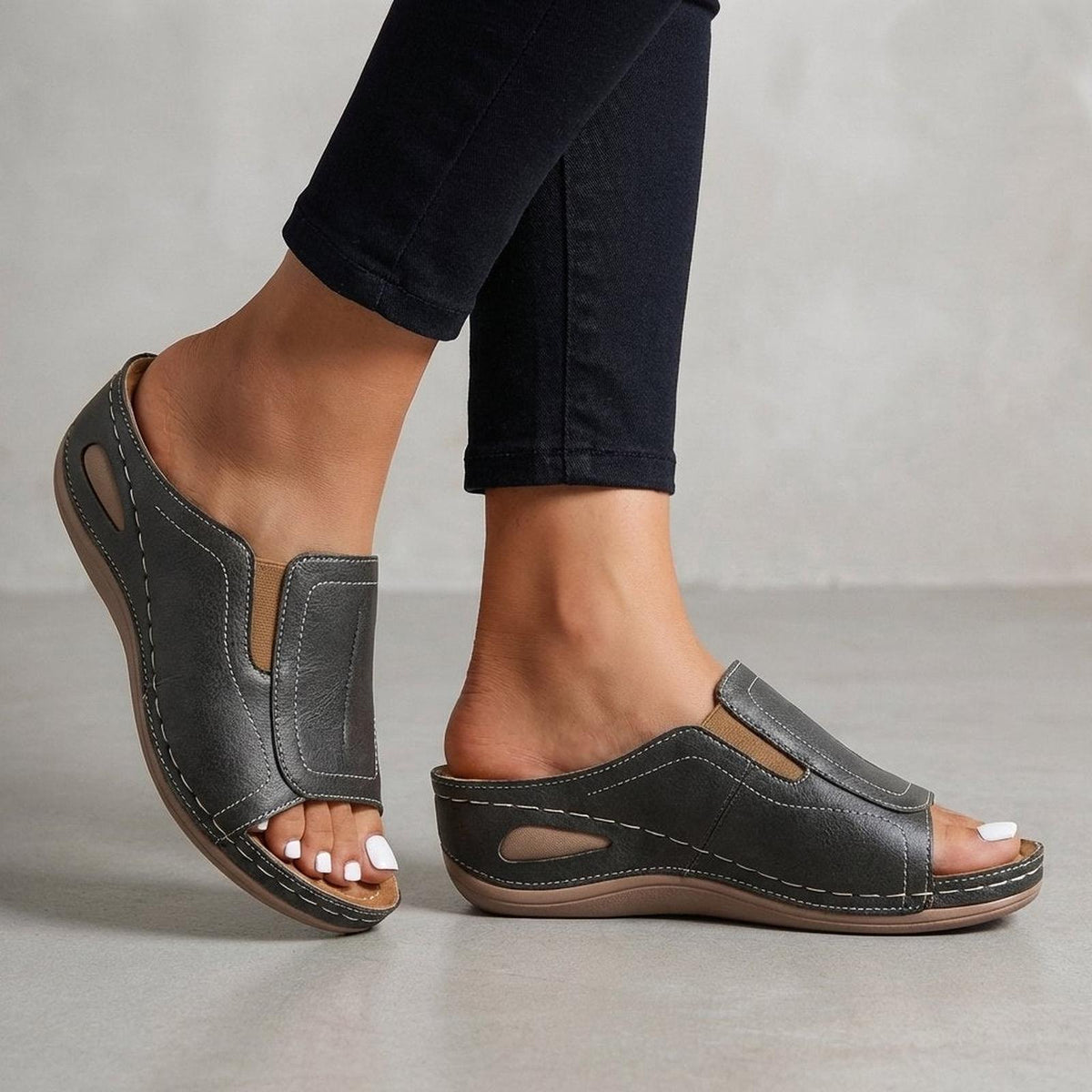 Orthopedic wedge sandals for women featuring arch support, open-toe design, and slip-on leather comfort, perfect for all-day wear. 1