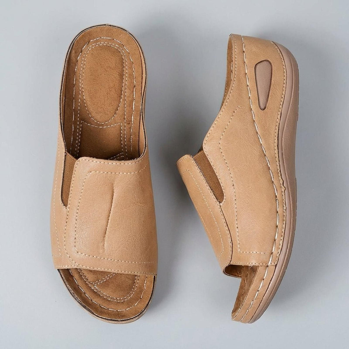 Orthopedic wedge sandals for women featuring arch support, open-toe design, and slip-on leather comfort, perfect for all-day wear. 5