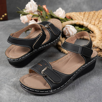 Orthopedic wedge sandals for women featuring cushioned support, adjustable fit, and a lightweight breathable design for all-day comfort. 6
