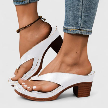 Orthopedic women's heels featuring an ergonomic footbed and shock-absorbing sole, designed in elegant synthetic leather for comfort and style. 6