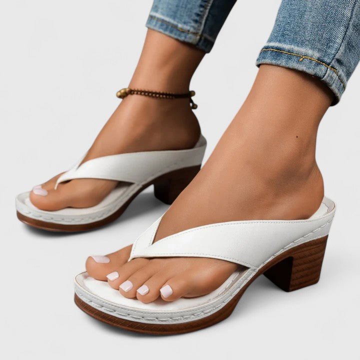 Orthopedic women's heels featuring an ergonomic footbed and shock-absorbing sole, designed in elegant synthetic leather for comfort and style. 4