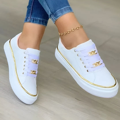Orthopedic women's sneakers featuring shock-absorbing soles and stylish golden accents for comfort and fashion. 0