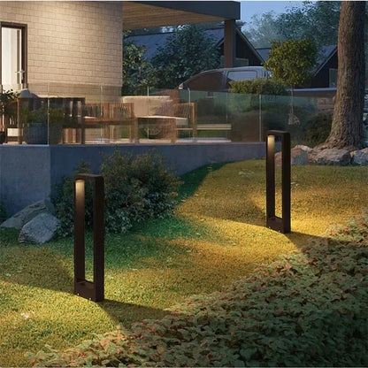 Outdoor LED ground lamp featuring a weather-resistant aluminum construction and a sleek modern minimalist design, perfect for illuminating gardens, pathways, and outdoor spaces. 4