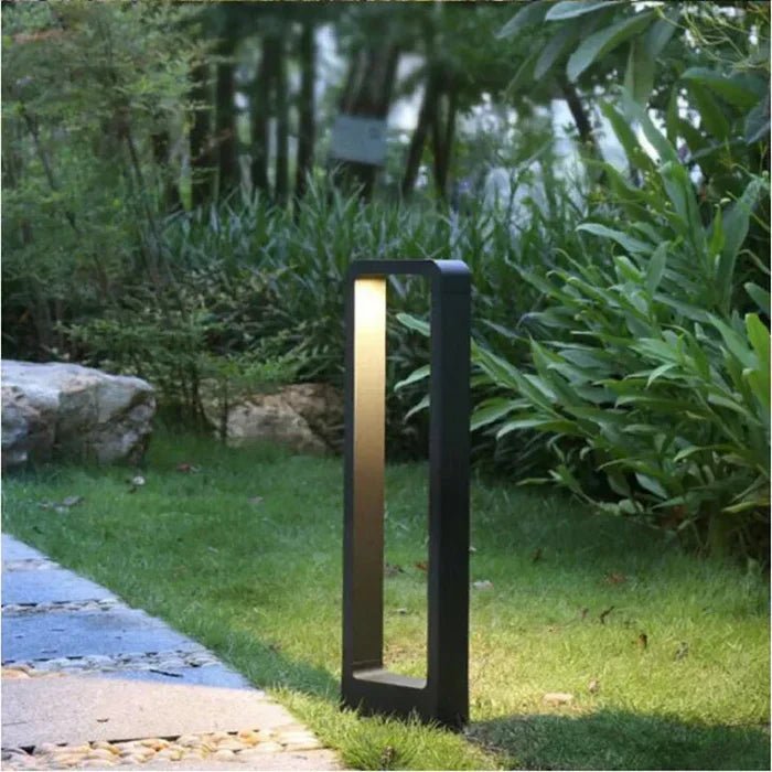 Outdoor LED ground lamp featuring a weather-resistant aluminum construction and a sleek modern minimalist design, perfect for illuminating gardens, pathways, and outdoor spaces. 1