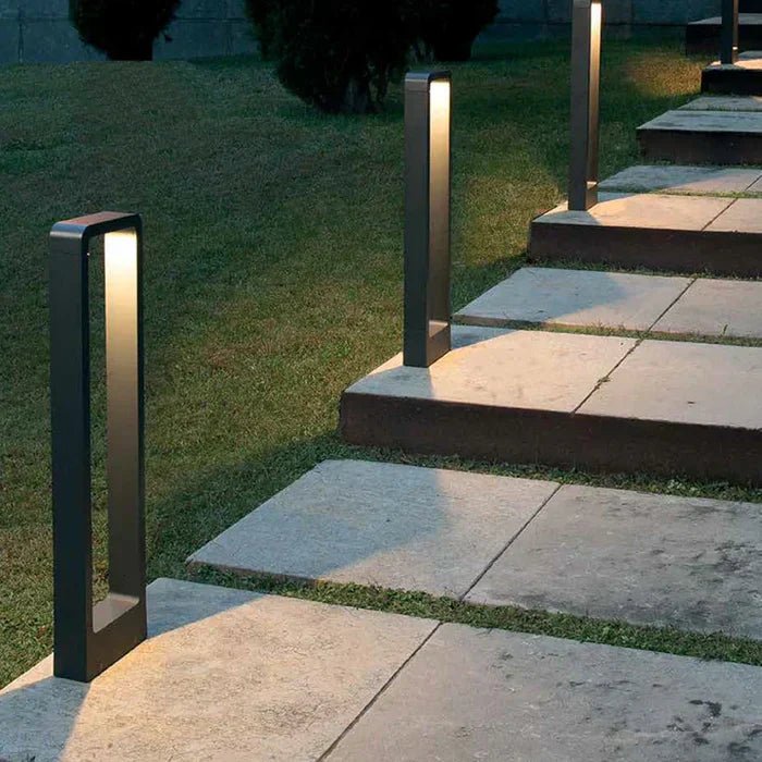 Outdoor LED ground lamp featuring a weather-resistant aluminum construction and a sleek modern minimalist design, perfect for illuminating gardens, pathways, and outdoor spaces. 2