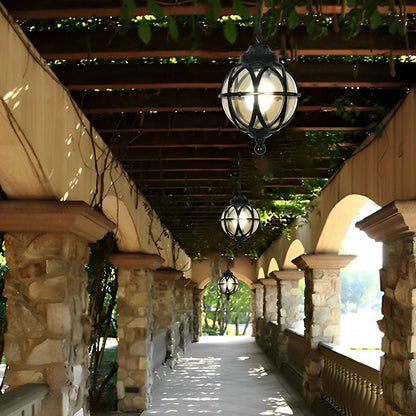 Outdoor pendant light featuring a stylish aluminum globe design, available in black or bronze finish, offered in multiple sizes for versatile outdoor decor. 1