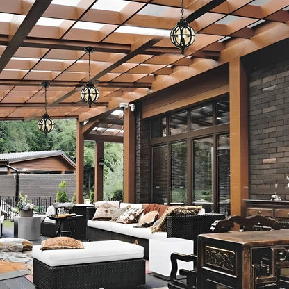 Outdoor pendant light featuring a stylish aluminum globe design, available in black or bronze finish, offered in multiple sizes for versatile outdoor decor. 6