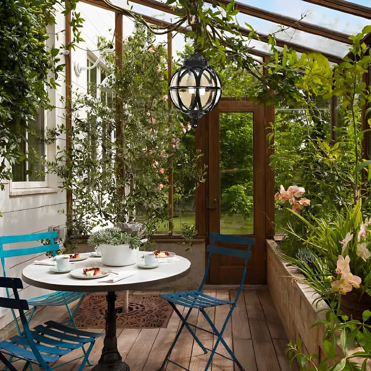 Outdoor pendant light featuring a stylish aluminum globe design, available in black or bronze finish, offered in multiple sizes for versatile outdoor decor. 8