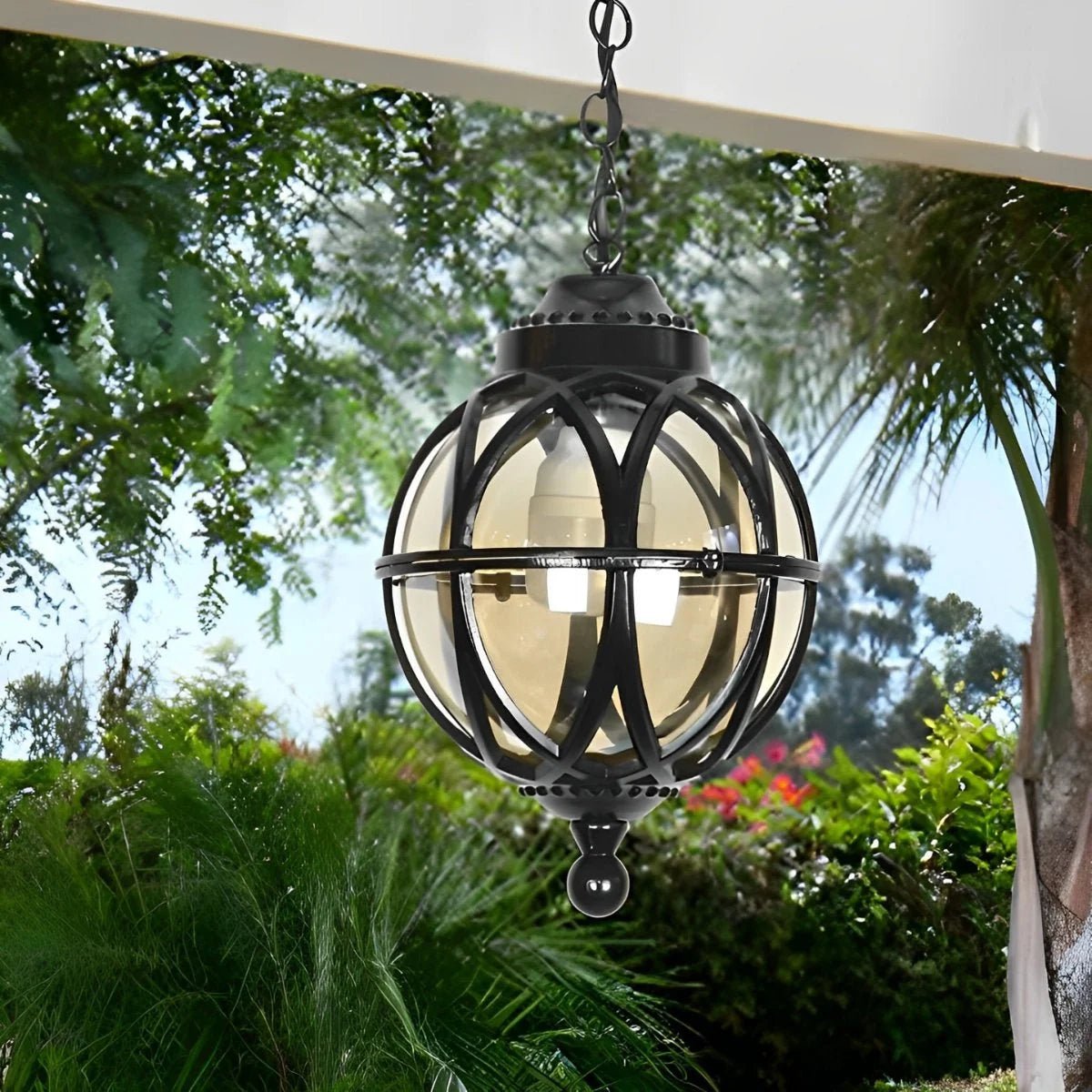 Outdoor pendant light featuring a stylish aluminum globe design, available in black or bronze finish, offered in multiple sizes for versatile outdoor decor. 0
