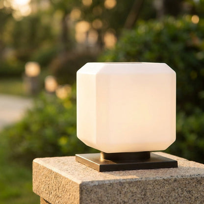 Outdoor solar garden light featuring a minimalist design, made from weatherproof metal, shaped like a sleek cube, perfect for enhancing outdoor spaces with eco-friendly illumination 1