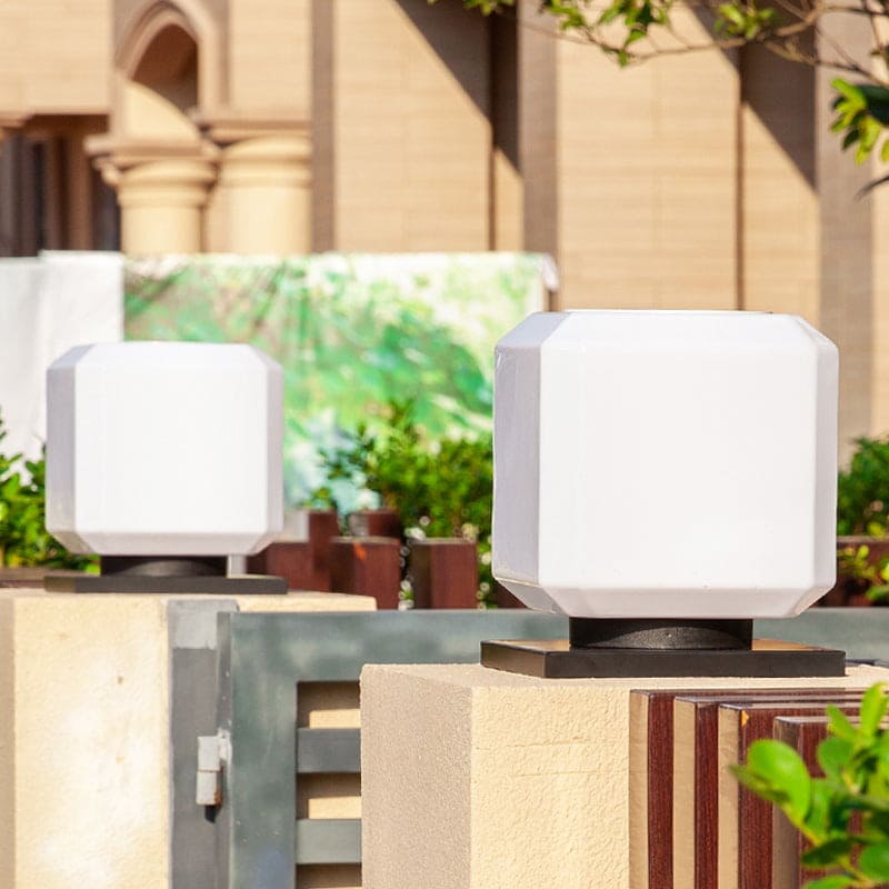 Outdoor solar garden light featuring a minimalist design, made from weatherproof metal, shaped like a sleek cube, perfect for enhancing outdoor spaces with eco-friendly illumination 4