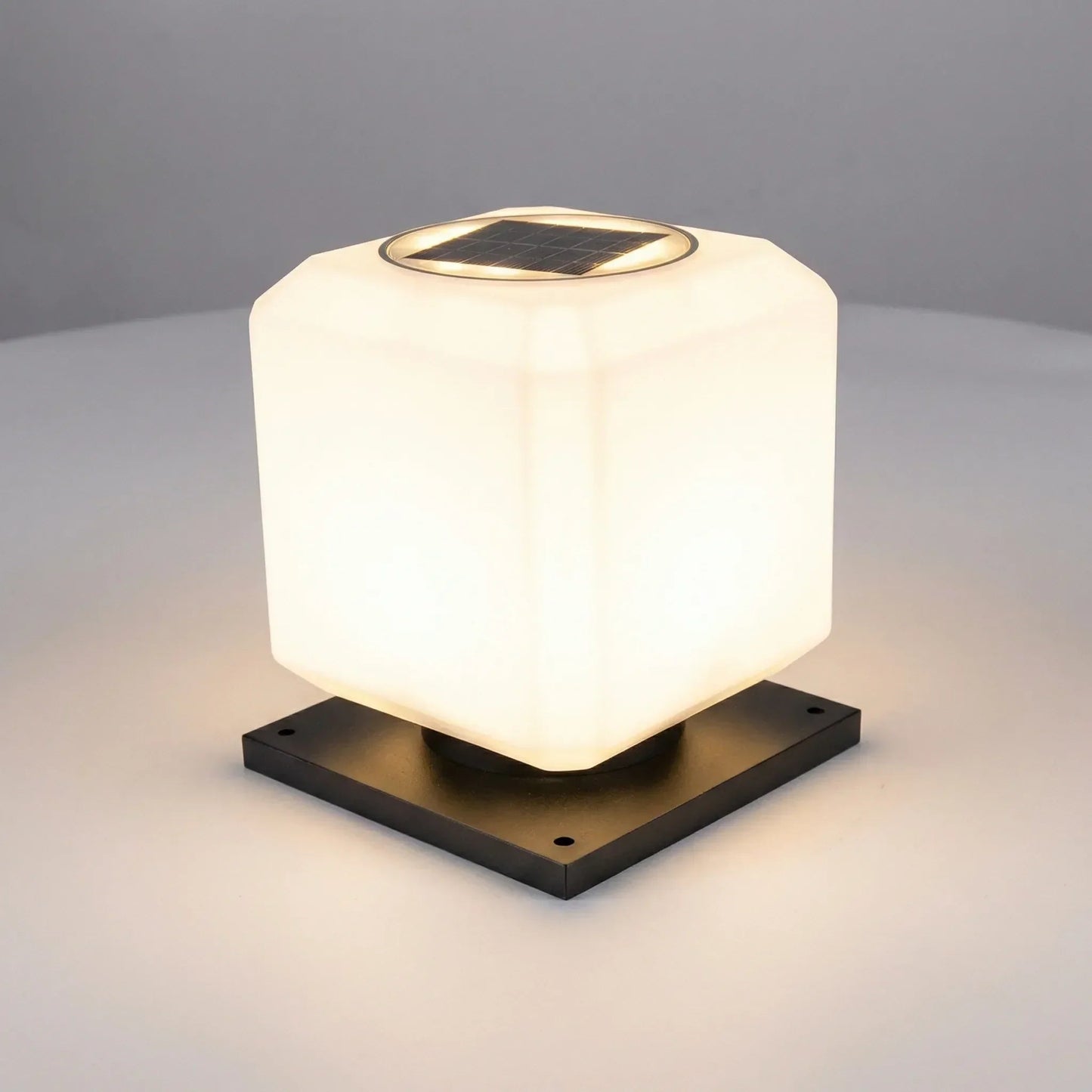 Outdoor solar garden light featuring a minimalist design, made from weatherproof metal, shaped like a sleek cube, perfect for enhancing outdoor spaces with eco-friendly illumination 5