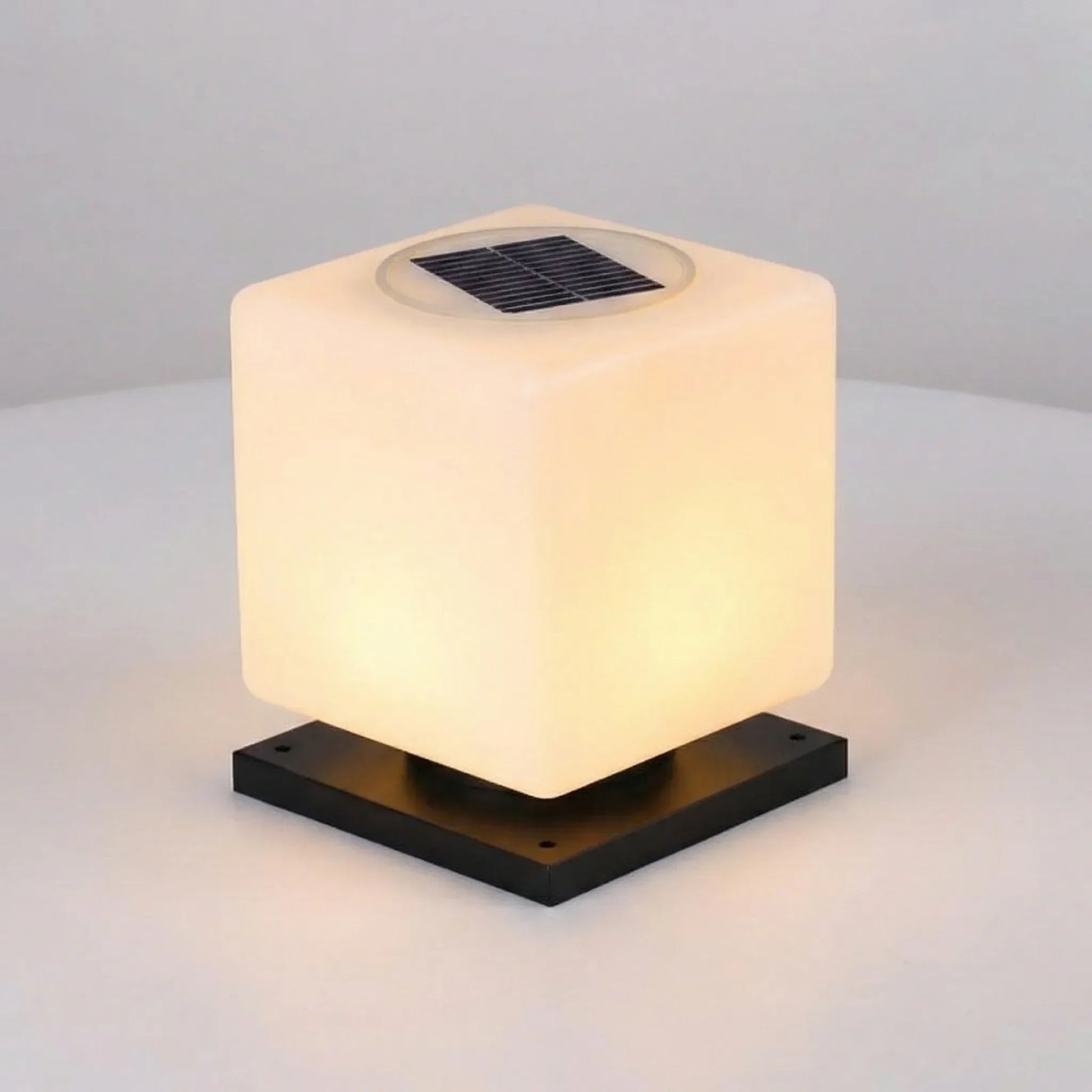Outdoor solar garden light featuring a minimalist design, made from weatherproof metal, shaped like a sleek cube, perfect for enhancing outdoor spaces with eco-friendly illumination 0