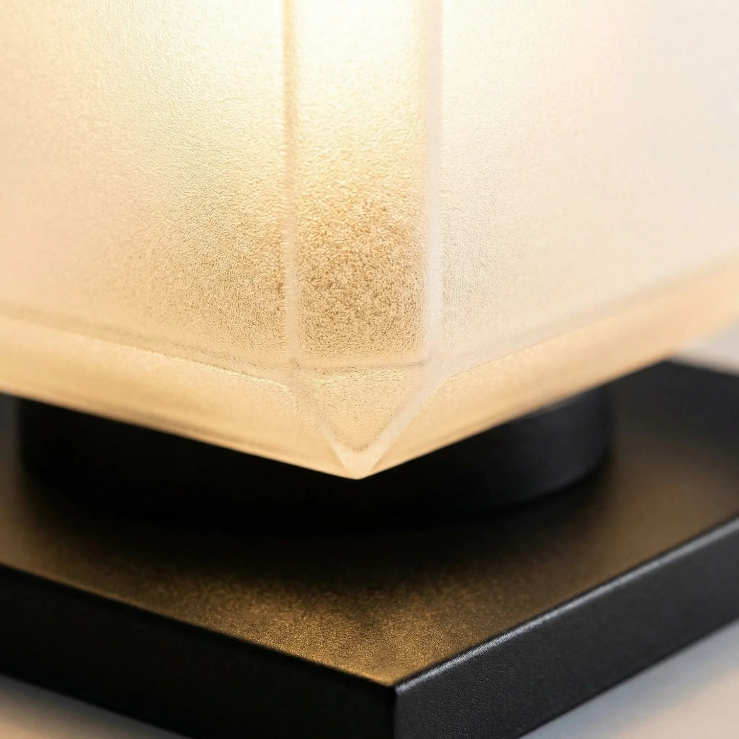 Outdoor solar garden light featuring a minimalist design, made from weatherproof metal, shaped like a sleek cube, perfect for enhancing outdoor spaces with eco-friendly illumination 3