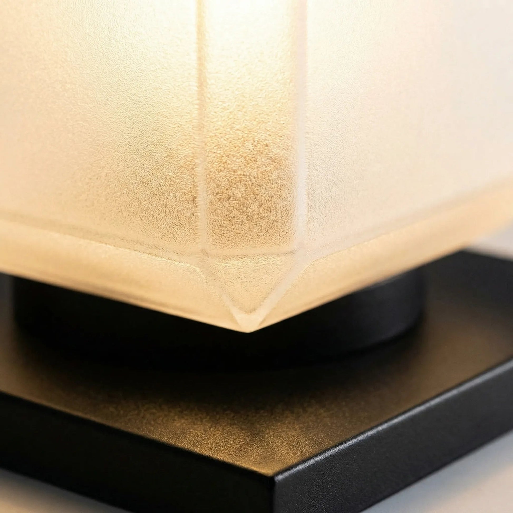Outdoor solar garden light featuring a minimalist design, made from weatherproof metal, shaped like a sleek cube, perfect for enhancing outdoor spaces with eco-friendly illumination 3