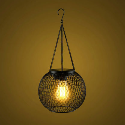 Outdoor solar lantern featuring a wrought iron hanging design, equipped with LED light, perfect for garden and patio decoration. 1
