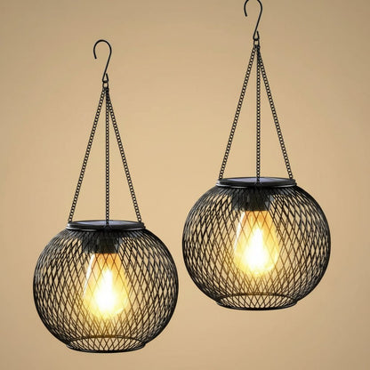Outdoor solar lantern featuring a wrought iron hanging design, equipped with LED light, perfect for garden and patio decoration. 3