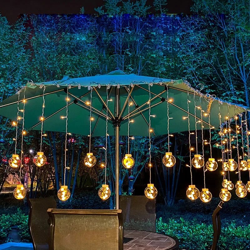 Outdoor string lights featuring a waterproof design, energy-efficient LED bulbs, perfect for enhancing garden and patio decor. 2