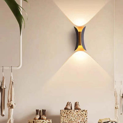 Outdoor wall lamp featuring a sleek curved design, dual LED emission, and a weather-resistant IP65 rating, ideal for enhancing exterior lighting in gardens and patios 5