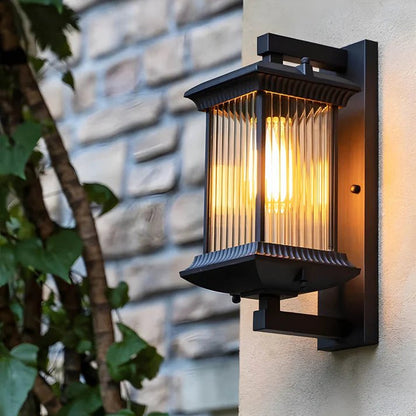 Outdoor wall lamp featuring elegant curved glass panels and a weather-resistant coffee brown metal finish, perfect for illuminating patios and entrances. 0