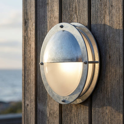 Outdoor wall lamp made of galvanized steel, featuring a weatherproof design and a dimming function, ideal for enhancing outdoor spaces with adjustable lighting. 0