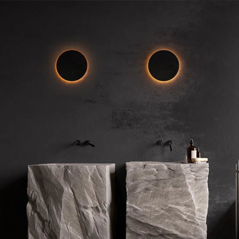 Modern outdoor wall lamp featuring up and down lighting, crafted from weatherproof metal for durable exterior use. 5