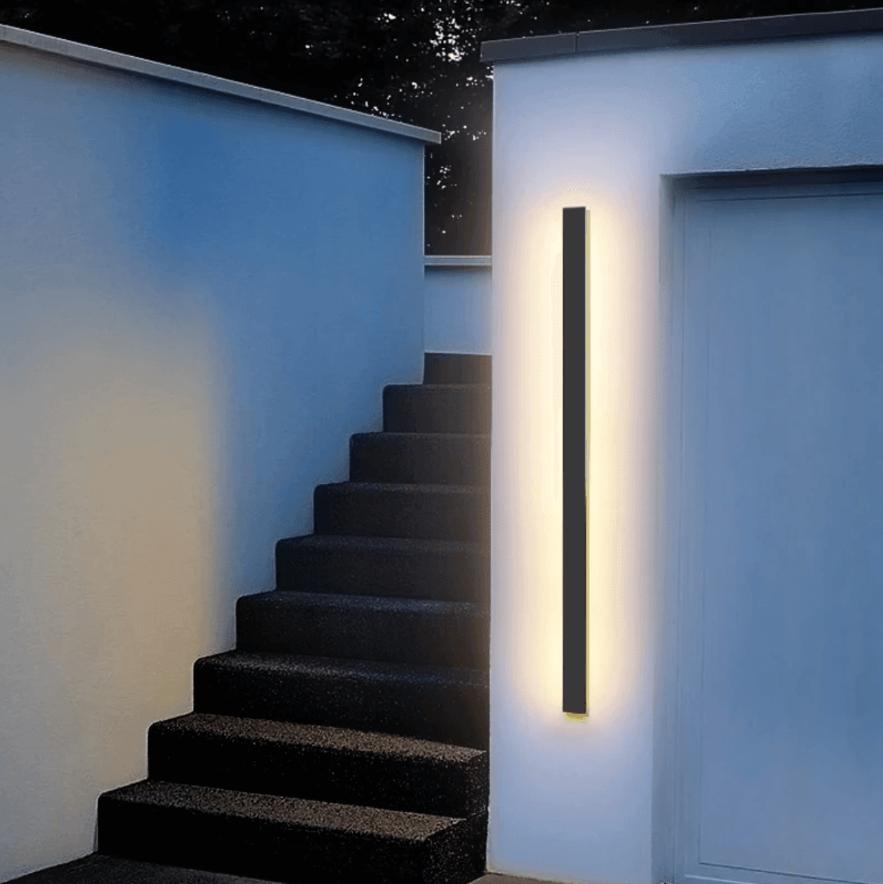 Outdoor wall lamp featuring warm LED lighting, crafted from weatherproof aluminum in a sleek vertical design, perfect for illuminating patios and gardens. 0