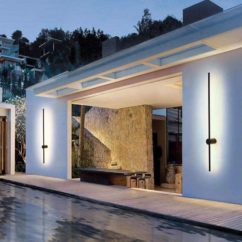 Modern aluminum outdoor wall light with weatherproof design, featuring energy-efficient LED technology, perfect for illuminating gardens and patios. 2