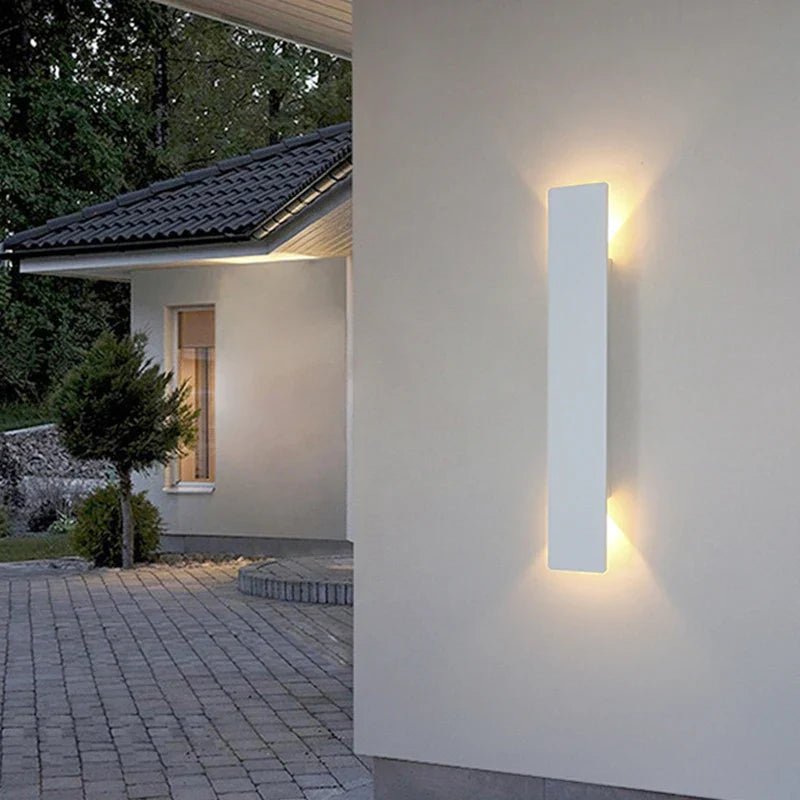 Outdoor wall lights featuring a waterproof aluminum construction and a minimalist design, showcasing a stylish bidirectional glow for enhanced outdoor ambiance. 7