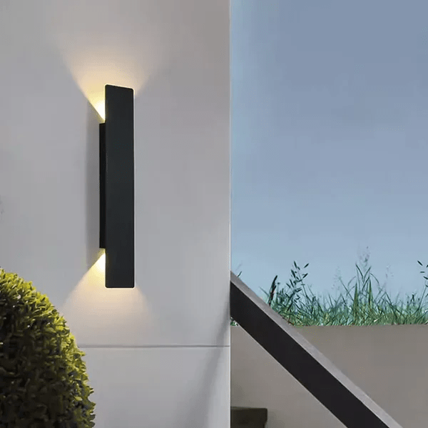 Outdoor wall lights featuring a waterproof aluminum construction and a minimalist design, showcasing a stylish bidirectional glow for enhanced outdoor ambiance. 6