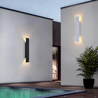 Outdoor wall lights featuring a waterproof aluminum construction and a minimalist design, showcasing a stylish bidirectional glow for enhanced outdoor ambiance. 3